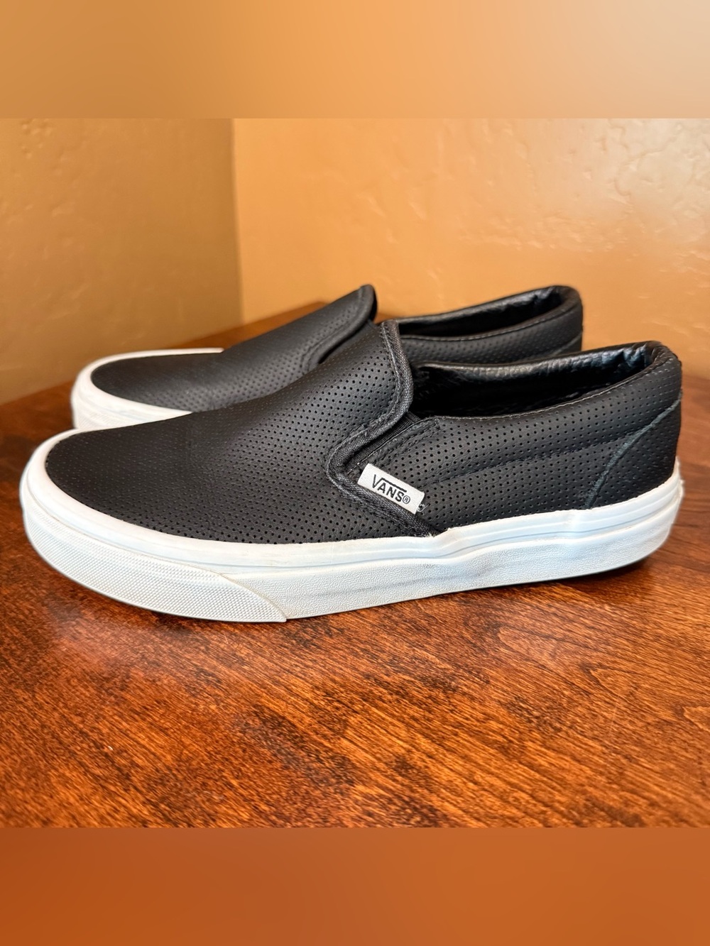Vans Black Perforated Slip-On Sneakers with White Sole
